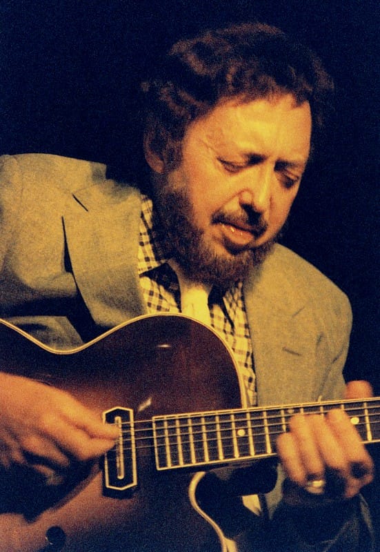 Barney Kessel playing guitar.